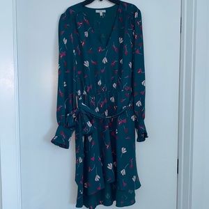 Joie knee-length dress in jade/forest green with pink flowers.